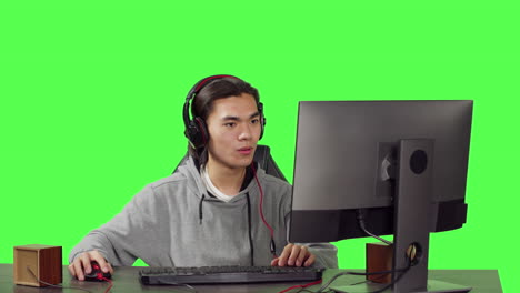 Asian-person-being-on-computer-at-desk